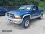 2004 Dodge Dakota SLT z VIN 1D7HG42N34S623403, wystawiony jako IAAI lot #42671593 z przebiegiem 142 220 mil mil oraz . Historia ofert i sprzedaży dostępna na DreamBid. Obrazek 2.