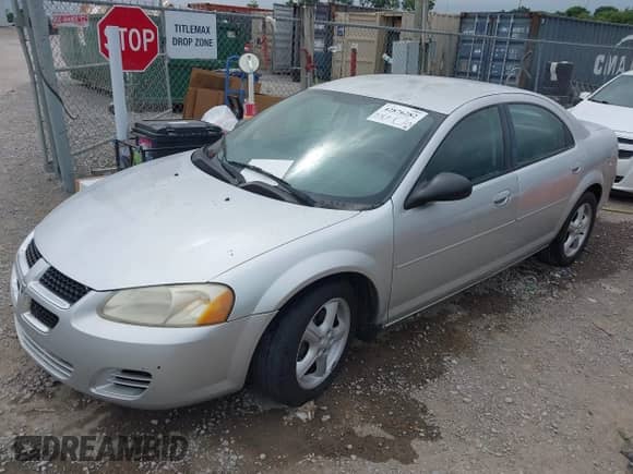 2005 Dodge Stratus SXT with VIN 1B3EL46TX5N676005, listed as a IAAI auction lot 42876282 with 171,952 mi miles and . Bid and sale history available at DreamBid. Image 6.