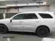 2015 Dodge Durango SXT with VIN 1C4RDJAG4FC202716, listed as a IAAI auction lot 43142717 with 169,362 mi miles and . Bid and sale history available at DreamBid. Image 14.