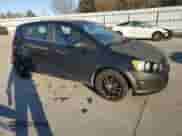 2014 Chevrolet Sonic LT z VIN 1G1JD6SB4E4170915, wystawiony jako Copart lot #85765024 z przebiegiem 127 777 mil mil oraz Szkoda całkowita • Salvage title. Historia ofert i sprzedaży dostępna na DreamBid. Obrazek 4.