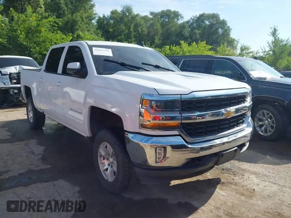 2018 Chevrolet Silverado 1500 LT with VIN 3GCUKRECXJG297097, listed as a IAAI auction lot 42662341 with 155,664 mi miles and . Bid and sale history available at DreamBid. Image 1.