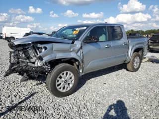 2024 Toyota Tacoma SR5 with VIN 3TMKB5FN5RM017499, listed as a Copart auction lot 89915235 with 13,174 mi miles and Salvage title. Bid and sale history available at DreamBid. Image 1.