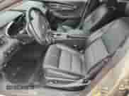 2015 Chevrolet Impala LT z VIN 2G1115SL7F9117779, wystawiony jako Copart lot #82261175 z przebiegiem 136 658 mil mil oraz Szkoda całkowita • Salvage title. Historia ofert i sprzedaży dostępna na DreamBid. Obrazek 7.