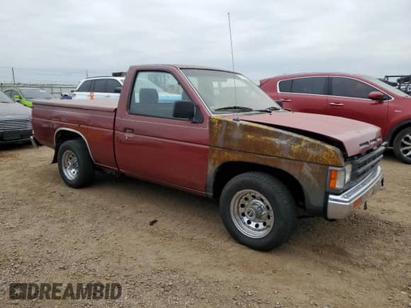 1991 Nissan Frontier with VIN 1N6SD11S8MC391807, listed as a Copart auction lot 71754165 with 251,736 mi miles and Clean title. Bid and sale history available at DreamBid. Image 4.