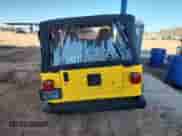 2003 Jeep Wrangler X z VIN 1J4FA39S23P370501, wystawiony jako Copart lot #81160855 z przebiegiem 155 930 mil mil oraz Szkoda całkowita • Salvage title. Historia ofert i sprzedaży dostępna na DreamBid. Obrazek 6.