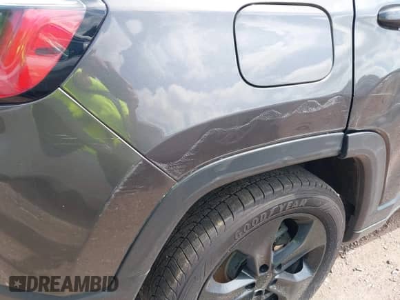 2019 Jeep Compass Latitude with VIN 3C4NJDBB3KT638113, listed as a IAAI auction lot 42510167 with 69,034 mi miles and . Bid and sale history available at DreamBid. Image 20.