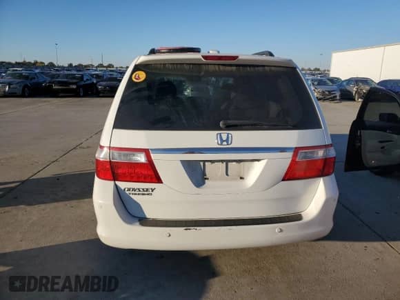 2006 Honda Odyssey Touring z VIN 5FNRL38806B108350, wystawiony jako Copart lot #86540185 z przebiegiem 193 582 mil mil oraz Szkoda całkowita • Salvage title. Historia ofert i sprzedaży dostępna na DreamBid. Obrazek 6.