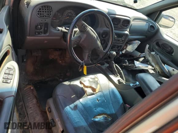 2003 Chevrolet TrailBlazer LT с VIN 1GNDS13SX32394962, выставлен на аукционе Copart как лот 53523435 с пробегом Не указан миль и Списание • Salvage title. История ставок и продаж доступна на DreamBid. Изображение 8.