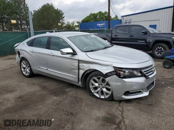 2020 Chevrolet Impala Premier with VIN 2G1105S34L9100517, listed as a Copart auction lot 70155565 with 104,623 mi miles and Salvage title. Bid and sale history available at DreamBid. Image 4.