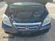 2007 Honda Odyssey EX-L с VIN 5FNRL38707B077318, выставлен на аукционе Copart как лот 71250165 с пробегом 174 272 миль миль и Списание • Salvage title. История ставок и продаж доступна на DreamBid. Изображение 12.