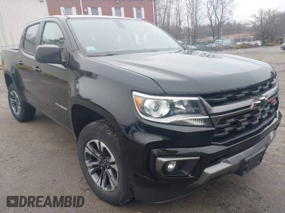 2021 Chevrolet Colorado 4WD Z71 with VIN 1GCGTDEN8M1226062, listed as a IAAI auction lot 41723424 with 20,956 mi miles and . Bid and sale history available at DreamBid. Image 1.