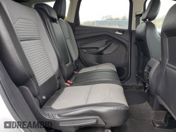 2018 Ford Escape SE z VIN 1FMCU9GD4JUB78529, wystawiony jako Copart lot #87490825 z przebiegiem 72 966 mil mil oraz Czysty tytuł • Clean title. Historia ofert i sprzedaży dostępna na DreamBid. Obrazek 11.