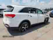 2016 Kia Sorento EX with VIN 5XYPH4A12GG186490, listed as a Copart auction lot 69231385 with 115,060 mi miles and Salvage title. Bid and sale history available at DreamBid. Image 3.