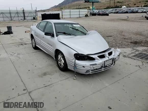 2001 Pontiac Grand Am SE1 с VIN 1G2NF52T21M607203, выставлен на аукционе Copart как лот 57080645 с пробегом 209 896 миль миль и Списание • Salvage title. История ставок и продаж доступна на DreamBid. Изображение 14.