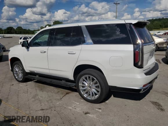 2023 Cadillac Escalade 4WD Premium Luxury with VIN 1GYS4CKL0PR491899, listed as a Copart auction lot 67749725 with 33,804 mi miles and Salvage title. Bid and sale history available at DreamBid. Image 2.