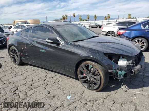 2013 Hyundai Genesis Coupe R-Spec with VIN KMHHU6KJ5DU104090, listed as a Copart auction lot 77754234 with 100,939 mi miles and Salvage title. Bid and sale history available at DreamBid. Image 4.