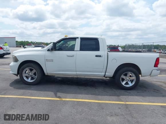 2018 Ram 1500 Express with VIN 3C6RR6KG5JG194863, listed as a IAAI auction lot 42133048 with 151,614 mi miles and . Bid and sale history available at DreamBid. Image 14.