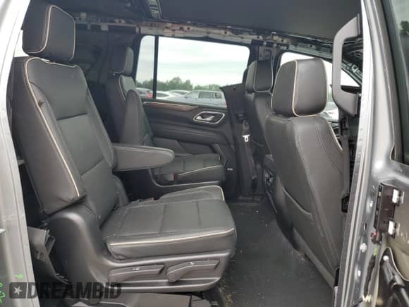 2023 Chevrolet Suburban Premier с VIN 1GNSKFKD4PR184099, выставлен на аукционе Copart как лот 65506385 с пробегом 35 153 миль миль и Списание • Salvage title. История ставок и продаж доступна на DreamBid. Изображение 11.