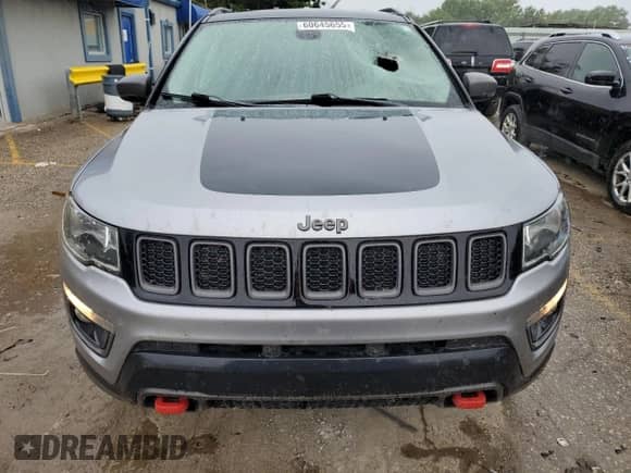 2019 Jeep Compass Trailhawk with VIN 3C4NJDDB7KT671080, listed as a Copart auction lot 60645655 with 131,581 mi miles and Salvage title. Bid and sale history available at DreamBid. Image 5.