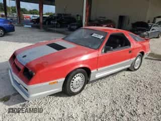 1986 Dodge Daytona z VIN 1B3BA64E7GG134747, wystawiony jako Copart lot #44496925 z przebiegiem Nie podano mil oraz Szkoda całkowita • Salvage title. Historia ofert i sprzedaży dostępna na DreamBid. Obrazek 1.