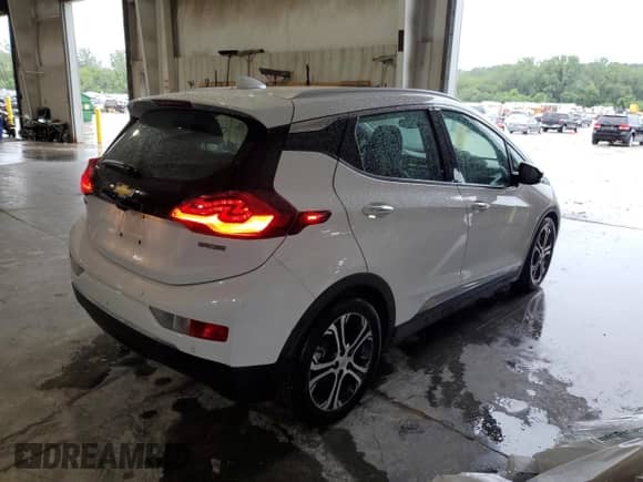 2018 Chevrolet Bolt EV Premier z VIN 1G1FX6S00J4116940, wystawiony jako Copart lot #65214265 z przebiegiem 52 307 mil mil oraz Szkoda całkowita • Salvage title. Historia ofert i sprzedaży dostępna na DreamBid. Obrazek 3.