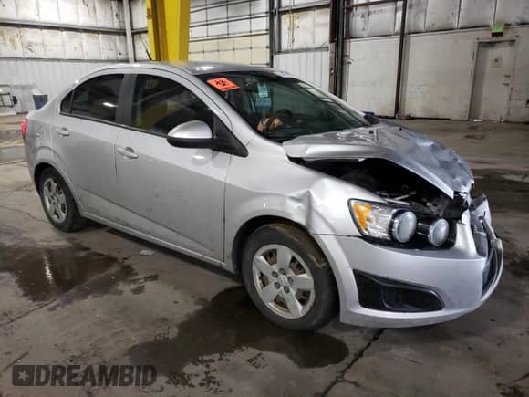 2013 Chevrolet Sonic LS с VIN 1G1JA5SH2D4225755, выставлен на аукционе Copart как лот 39410934 с пробегом 97 172 миль миль и Списание • Salvage title. История ставок и продаж доступна на DreamBid. Изображение 4.