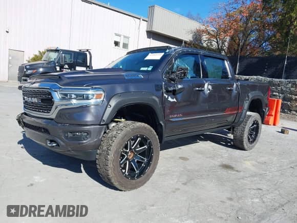 2019 Ram 1500 Limited z VIN 1C6SRFHT4KN588563, wystawiony jako IAAI lot #43503144 z przebiegiem 54 603 mil mil oraz . Historia ofert i sprzedaży dostępna na DreamBid. Obrazek 20.