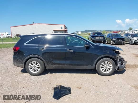2019 Kia Sorento LX with VIN 5XYPGDA58KG525977, listed as a IAAI auction lot 42659114 with 99,163 mi miles and . Bid and sale history available at DreamBid. Image 14.