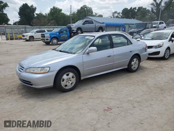 2002 Honda Accord EX with VIN 1HGCG16592A021350, listed as a Copart auction lot 64458915 with 170,790 mi miles and Clean title. Bid and sale history available at DreamBid. Image 1.