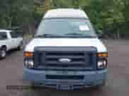 2014 Ford Econoline Cargo Commercial with VIN 1FTNS2EW0EDA98374, listed as a IAAI auction lot 43121075 with 159,540 mi miles and . Bid and sale history available at DreamBid. Image 12.