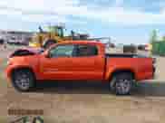 2018 Toyota Tacoma SR5 with VIN 5TFAZ5CN4JX064016, listed as a IAAI auction lot 43222144 with 74,935 mi miles and . Bid and sale history available at DreamBid. Image 14.