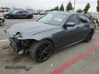 2020 BMW 3 Series 330i with VIN 3MW5R1J0XL8B33582, listed as a Copart auction lot 80404915 with 88,593 mi miles and Salvage title. Bid and sale history available at DreamBid. Image 1.