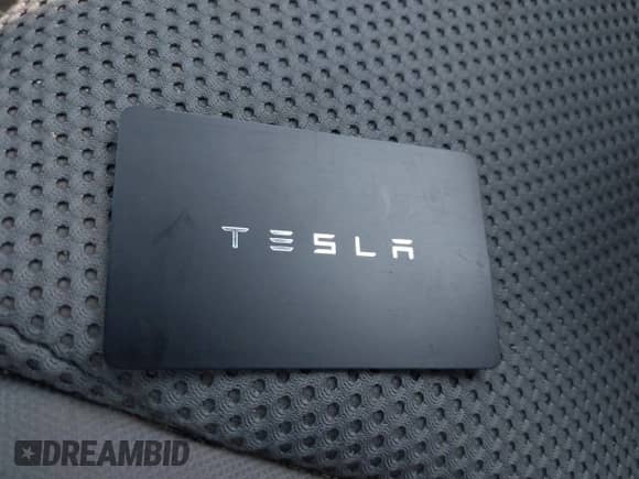 2023 Tesla Model Y Long Range z VIN 7SAYGAEE8PF880355, wystawiony jako IAAI lot #42635761 z przebiegiem 57 442 mil mil oraz . Historia ofert i sprzedaży dostępna na DreamBid. Obrazek 11.
