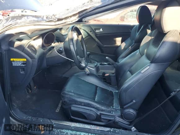 2010 Hyundai Genesis Coupe z VIN KMHHU6KH1AU031468, wystawiony jako Copart lot #74506224 z przebiegiem 100 881 mil mil oraz Szkoda całkowita • Salvage title. Historia ofert i sprzedaży dostępna na DreamBid. Obrazek 7.