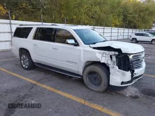 2018 Chevrolet Suburban Premier z VIN 1GNSKJKC5JR264383, wystawiony jako IAAI lot #43418058 z przebiegiem 105 696 mil mil oraz . Historia ofert i sprzedaży dostępna na DreamBid. Obrazek 1.