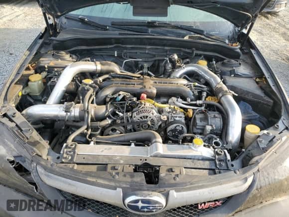 2009 Subaru WRX с VIN JF1GE76649G511709, выставлен на аукционе Copart как лот 77744384 с пробегом 158 031 миль миль и Списание • Salvage title. История ставок и продаж доступна на DreamBid. Изображение 11.