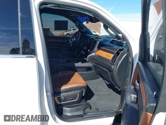 2022 Ram 1500 Longhorn with VIN 1C6SRFKT9NN310304, listed as a IAAI auction lot 41333349 with 40,055 mi miles and . Bid and sale history available at DreamBid. Image 5.