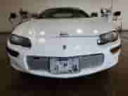 2000 Chevrolet Camaro z VIN 2G1FP32K3Y2148572, wystawiony jako Copart lot #43952864 z przebiegiem Nie podano mil oraz Szkoda całkowita • Salvage title. Historia ofert i sprzedaży dostępna na DreamBid. Obrazek 5.