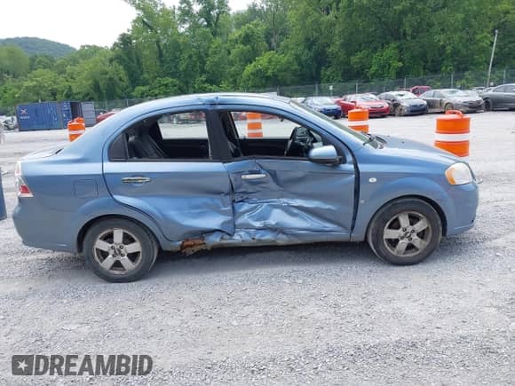 2008 Chevrolet Aveo LT z VIN KL1TG56608B051166, wystawiony jako IAAI lot #42404470 z przebiegiem 162 198 mil mil oraz . Historia ofert i sprzedaży dostępna na DreamBid. Obrazek 13.