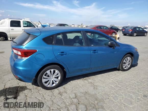2017 Subaru Impreza with VIN 4S3GTAA66H3710643, listed as a Copart auction lot 80579135 with 56,230 mi miles and Salvage title. Bid and sale history available at DreamBid. Image 3.