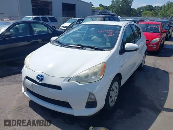 2012 Toyota Prius One z VIN JTDKDTB3XC1527533, wystawiony jako IAAI lot #42879082 z przebiegiem 234 262 mil mil oraz . Historia ofert i sprzedaży dostępna na DreamBid. Obrazek 2.