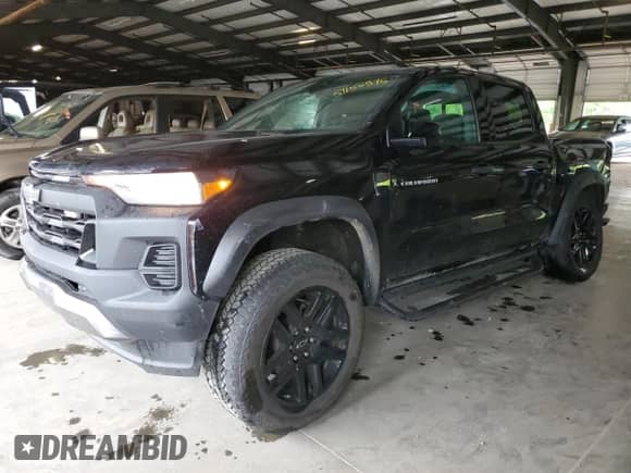 2023 Chevrolet Colorado 4WD Trail Boss с VIN 1GCPTEEK8P1156367, выставлен на аукционе Copart как лот 57150575 с пробегом 14 476 миль миль и Списание • Salvage title. История ставок и продаж доступна на DreamBid. Изображение 1.