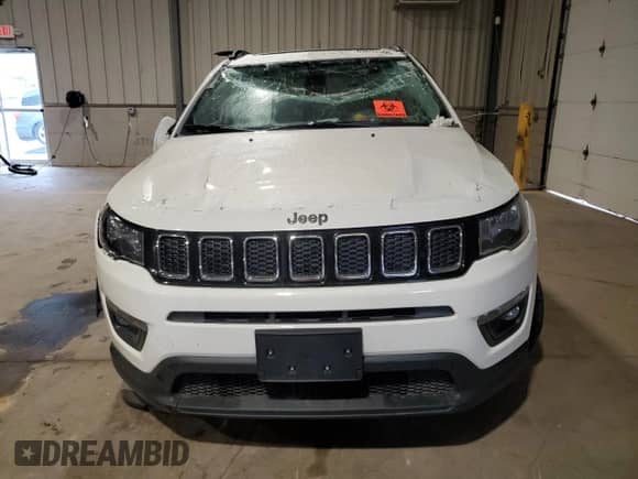 2018 Jeep Compass Latitude with VIN 3C4NJDBB9JT492251, listed as a Copart auction lot 63692595 with 82,820 mi miles and Salvage title. Bid and sale history available at DreamBid. Image 5.