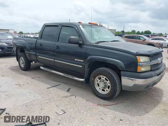 2003 Chevrolet Silverado 1500HD LS z VIN 1GCGK13U63F214778, wystawiony jako IAAI lot #42141435 z przebiegiem 161 669 mil mil oraz . Historia ofert i sprzedaży dostępna na DreamBid. Obrazek 1.