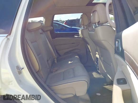 2018 Jeep Grand Cherokee Overland with VIN 1C4RJFCG3JC207160, listed as a IAAI auction lot 43300480 with 87,075 mi miles and . Bid and sale history available at DreamBid. Image 8.