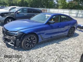 2024 BMW i4 M50 z VIN WBY33AW0XRFT10327, wystawiony jako Copart lot #64826705 z przebiegiem 4 697 mil mil oraz Szkoda całkowita • Salvage title. Historia ofert i sprzedaży dostępna na DreamBid. Obrazek 1.