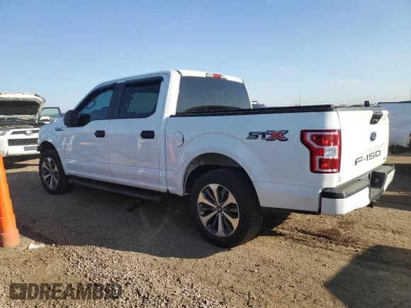2020 Ford F-150 XL with VIN 1FTEW1CPXLFA15710, listed as a Copart auction lot 61944055 with 98,561 mi miles and Salvage title. Bid and sale history available at DreamBid. Image 2.