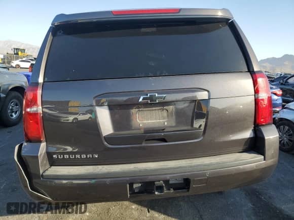 2018 Chevrolet Suburban LT with VIN 1GNSCHKC4JR321856, listed as a Copart auction lot 68912825 with 68,787 mi miles and Salvage title. Bid and sale history available at DreamBid. Image 6.