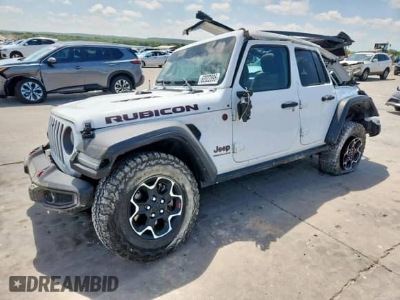 2023 Jeep Wrangler Rubicon with VIN 1C4HJXFG9PW534828, listed as a Copart auction lot 62022895 with 20,476 mi miles and Salvage title. Bid and sale history available at DreamBid. Image 1.