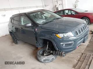 2018 Jeep Compass Trailhawk z VIN 3C4NJDDB9JT499617, wystawiony jako IAAI lot #42460317 z przebiegiem 79 567 mil mil oraz . Historia ofert i sprzedaży dostępna na DreamBid. Obrazek 1.